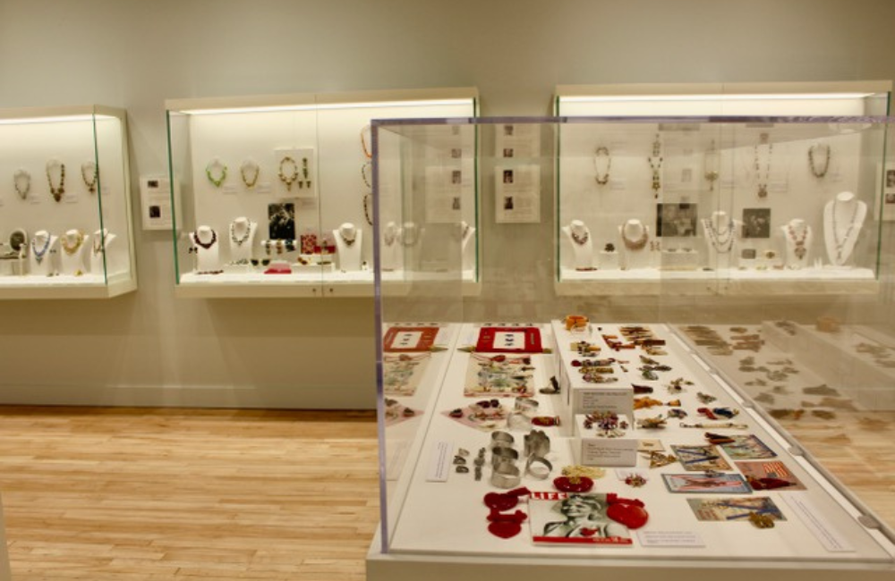 Collections behind glass at the Museum of Costume Jewelry