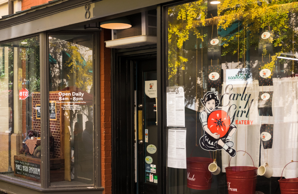 Glass windows of a downtown Asheville restaurant