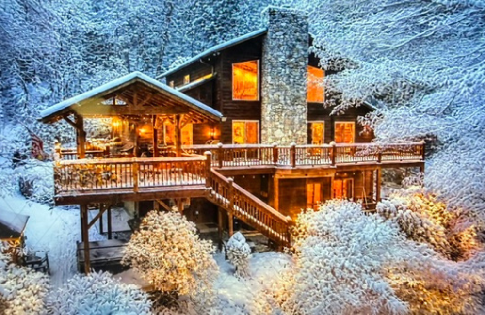 Snow-covered luxury cabin exterior