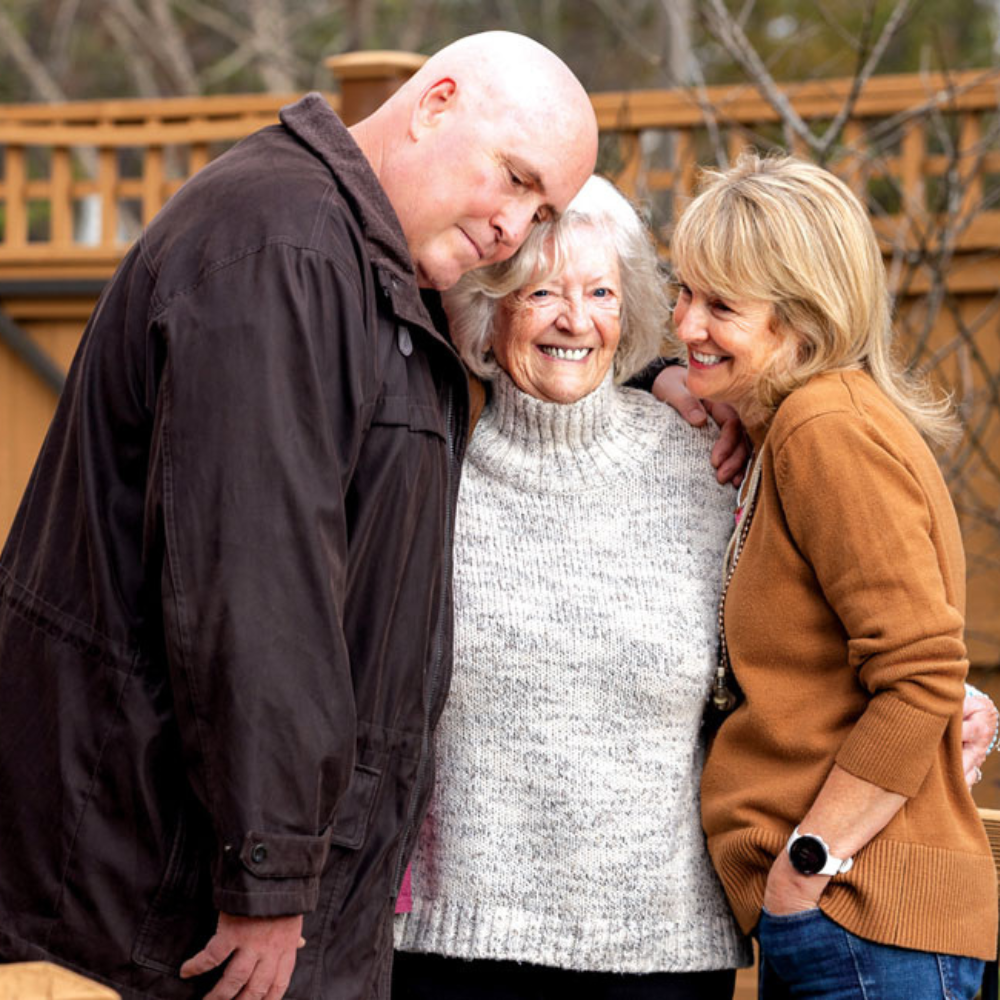 Family hugging joyfully