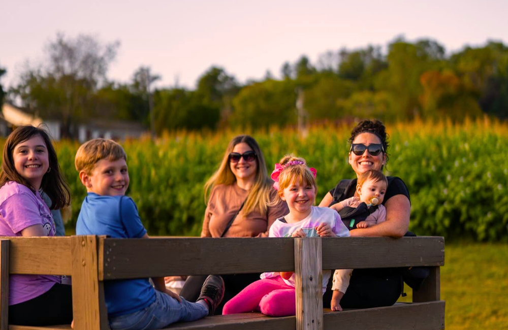 Family tractor wagon rides at Eliada Corn Maze Asheville
