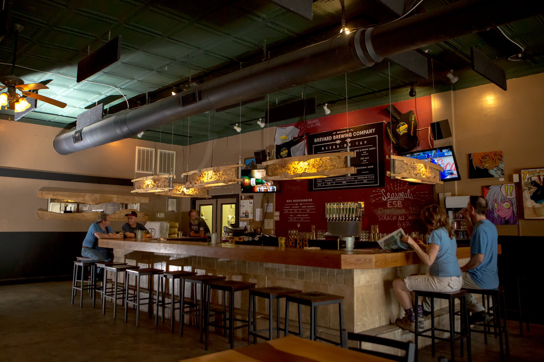 Interior of a bar during daytime at Brevard Brewing Company