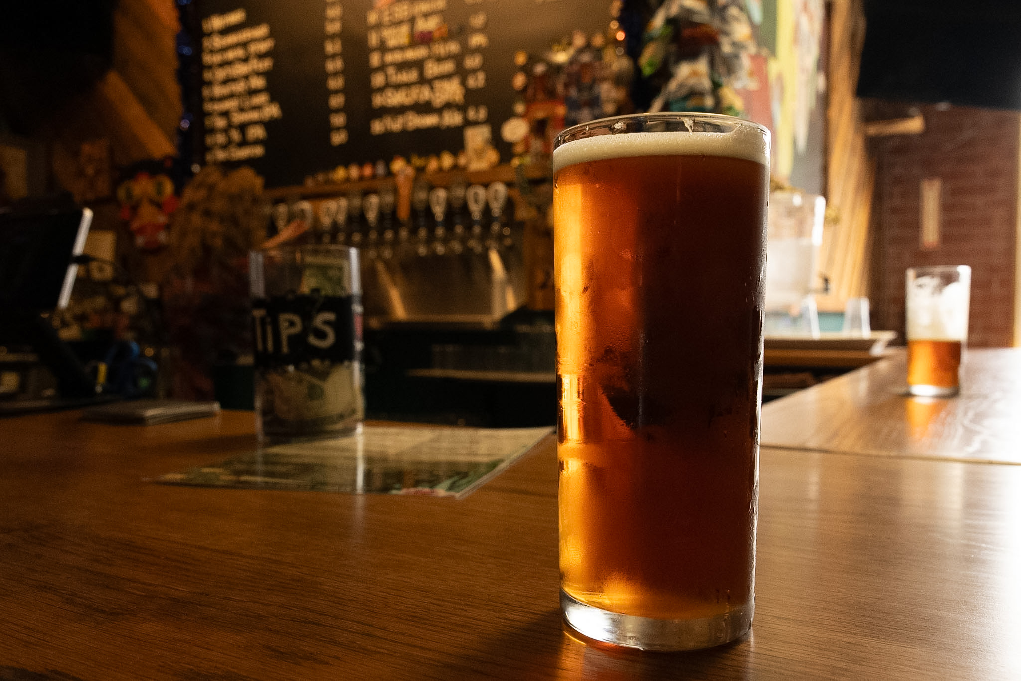 A medium colored pint of beer at Griffon and Sphinx Brewery