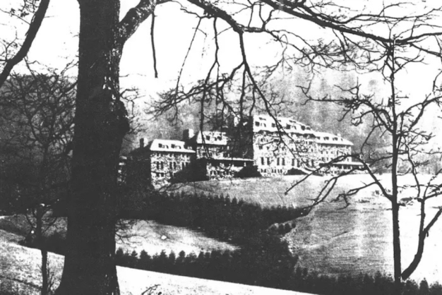 The Pink Lady Party Spooky black and white photo of the exterior of the Grove Park Inn